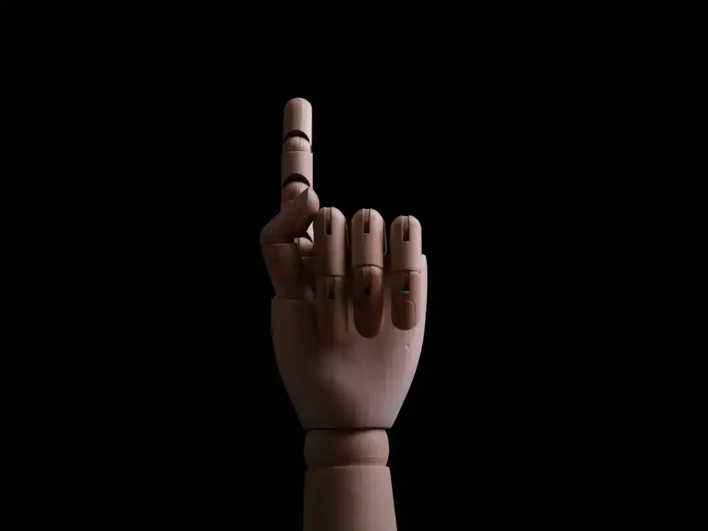 Exposed wooden joint articulation on a puppet arm